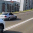 На кадре из видео, которое снял один из гостей свадьбы, хорошо видно, как участники свадебного кортежа нарушают правила дорожного движения — едут в тонированных автомобилях по полосе встречного движения да еще и везут пассажира, который наполовину вылез из окна салона. - Газета СМ Номер один
