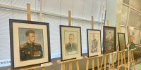 Портреты участников СВО из Иркутской области представили на выставке в Госдуме РФ - Министерство культуры