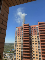 Пожар произошел в многоэтажке в Иркутском районе